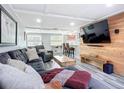 Finished basement featuring a comfortable seating area, wet bar, and entertainment space at 4231 8Th N St, St Petersburg, FL 33703