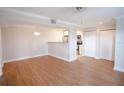 Bright living room features wood floors and modern lighting at 455 Alt 19 S # 235, Palm Harbor, FL 34683
