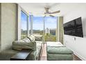 Comfortable living room with floor-to-ceiling windows and abundant natural light at 777 N Ashley Dr # 402, Tampa, FL 33602