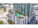 Rooftop pool and lounging area offering panoramic city views at 777 N Ashley Dr # 402, Tampa, FL 33602