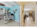 Bright office space with custom built-in shelving and contemporary decor at 13312 Waterford Castle Dr, Dade City, FL 33525