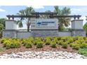Crosswind Point community sign with stone base and professional landscaping at 7721 Twin Leaf Ter, Parrish, FL 34219