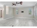 Spacious living room with white-tiled floors and natural light at 923 Lumsden Reserve Dr, Brandon, FL 33511