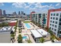 Condo building with pool, patios, and city view at 1120 E Kennedy Blvd # 1228, Tampa, FL 33602