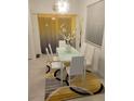 Modern dining room featuring a white table with matching chairs and stylish yellow rug at 5131 Forum Blvd, Holiday, FL 34690