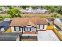 Bird's eye view of the property featuring a well-kept roof, fenced yard and neighborhood at 9201 Spy Glass Ct, Tampa, FL 33615