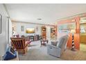 Inviting living room showcasing open layout, television, and decorative elements at 2702 Ochatilla Rd, Holiday, FL 34691