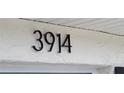 Close up of address number 3914 on the exterior of a home at 3914 W Cleveland St, Tampa, FL 33609