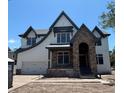 Eye-catching two-story home with stone archway and modern architectural details at 4224 W Corona St, Tampa, FL 33629