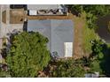 An aerial view of the roof, backyard, and landscaping of the property at 1393 Chesterfield Dr, Dunedin, FL 34698