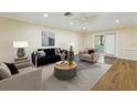 Bright living room with hardwood floors and neutral decor, great for entertaining and relaxing at 1515 12Th Se Ct # 55, Largo, FL 33771