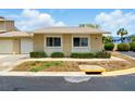 Charming one-story home featuring a neutral color scheme, well-kept landscaping, and an inviting ambiance at 1671 Cape Ann Ne Ave # 4, St Petersburg, FL 33702