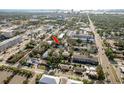 Aerial view showcasing the home's location within a vibrant neighborhood with easy access to major roads at 110 Kenwood Ave, Clearwater, FL 33755