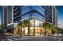 Modern building entrance showcasing sleek architectural details, glass windows, and street view at 1101 E Jackson St # 2015, Tampa, FL 33602