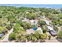 Beautiful home with private backyard nestled among mature trees, offering serene outdoor living in a desirable neighborhood at 316 5Th N Ave, Safety Harbor, FL 34695