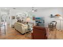 Bright living room with hardwood floors, comfortable seating, and an open floor plan at 316 5Th N Ave, Safety Harbor, FL 34695