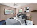 Comfortable bedroom with soft colors, two windows, and a well-dressed bed at 3251 34Th N Ave, St Petersburg, FL 33713