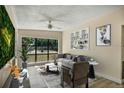 Bright living room with a large window offering ample natural light and neutral decor at 3251 34Th N Ave, St Petersburg, FL 33713
