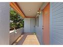 Condo entrance with wood floor, natural light, and neutral tones create an inviting, comfortable arrival at 10265 Gandy N Blvd # 1406, St Petersburg, FL 33702