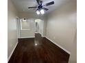 Inviting living room featuring beautiful hardwood floors and neutral walls, perfect for relaxation at 17977 Villa Creek Dr # 17977, Tampa, FL 33647