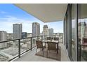 Balcony with dining set and stunning skyline views at 301 1St S St # 2305, St Petersburg, FL 33701