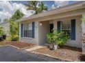 Attractive single-story home with blue shutters, neat landscaping, and a well-kept front entrance at 333 Bay Pl, Safety Harbor, FL 34695
