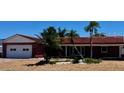 Charming single-story home with a well-maintained brick exterior and front yard landscaping at 510 64Th Ave, St Pete Beach, FL 33706