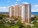 Beautiful condominium exterior, showcasing the coastal style architecture and water views at 5823 Bowen Daniel Dr # 906, Tampa, FL 33616