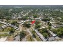 Community aerial view showing property location, mature trees, and surrounding neighborhood streets at 1472 Mission Hills Blvd # 24F, Clearwater, FL 33759