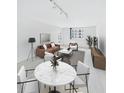 Bright and airy living room featuring modern decor, neutral tones and contemporary finishes at 201 W Laurel St # 504B, Tampa, FL 33602