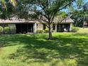 The generous backyard offers space for relaxation and outdoor activities at 2506 Laurelwood Dr # 4C, Clearwater, FL 33763