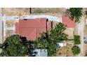 Aerial view of the home, showcasing its well-maintained roof and lush surrounding landscape at 4519 5Th S Ave, St Petersburg, FL 33711
