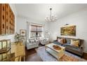 Bright living room features a cozy seating area and large window, perfect for relaxation at 4804 W Beachway Dr, Tampa, FL 33609