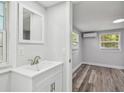 Bathroom with modern vanity and an adjoining room at 850 Center Ave, Brandon, FL 33511