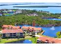 Gorgeous waterfront townhomes nestled in a community with scenic water views and terracotta tile roofs at 11 Franklin S Ct # C, St Petersburg, FL 33711