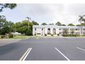Well-maintained condominium complex with manicured landscaping and ample parking at 1975 W Bay Dr # 301, Largo, FL 33770