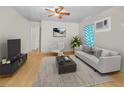 Bright living room features hardwood floors, modern furniture, and natural lighting at 2001 29Th N Ave, St Petersburg, FL 33713