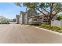 Charming two-story building with professionally designed landscaping and private parking at 337 S Plant Ave, Tampa, FL 33606