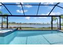 Relaxing screened pool overlooking tranquil lake views at 5814 Silver Sun Dr, Apollo Beach, FL 33572