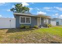Well-kept single-story home with a fenced yard and tidy landscaping at 11104 Hackney Dr, Riverview, FL 33578