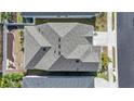 Aerial view of the meticulously maintained roof highlighting its intricate design and durability at 1432 Gopher Loop, Tarpon Springs, FL 34689
