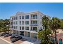 Upscale condo building with balconies and convenient parking, in a vibrant neighborhood at 231 2Nd S St # 201, Safety Harbor, FL 34695