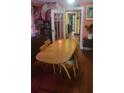 View of the dining room with vintage table and seating at 4303 N 10Th St, Tampa, FL 33603