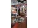 Open living space with hardwood floors and view to the dining room at 4303 N 10Th St, Tampa, FL 33603