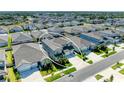 Aerial view of the home nestled in a residential neighborhood at 13071 Willow Grove Dr, Riverview, FL 33579
