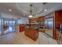 Beautiful kitchen with island, stainless appliances, and gorgeous countertops at 17735 Gulf Blvd # 202, Redington Shores, FL 33708