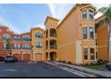 Beautiful condo building features a Mediterranean design, balconies, and attached garages at 2717 Via Cipriani # 631B, Clearwater, FL 33764