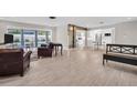 An open-concept living area seamlessly connects to the dining and kitchen spaces at 307 Orangewood Ln, Largo, FL 33770