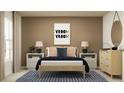 Well-decorated bedroom featuring a comfortable bed, bedside tables, and modern decor at 10282 Purple Leaf Ct, Riverview, FL 33578
