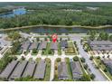 Aerial view of a home located on a spacious lot with lake view in Starkey Ranch at 12462 Rangeland Blvd, Odessa, FL 33556